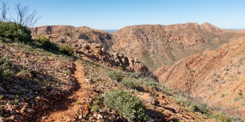 Walking path through mountains, Larapinta Trail - Australian Stock Image