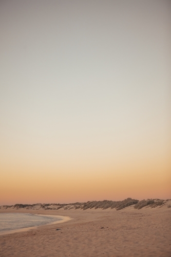 Warm summers evening sunset over beach - Australian Stock Image