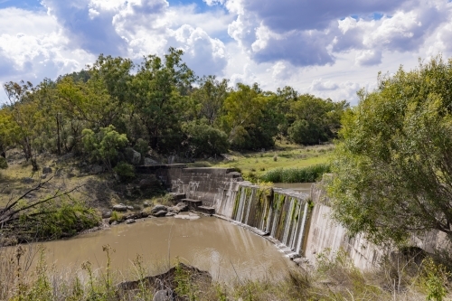 Water cascading over spillway in the Liverpool Plains NSW - Australian Stock Image