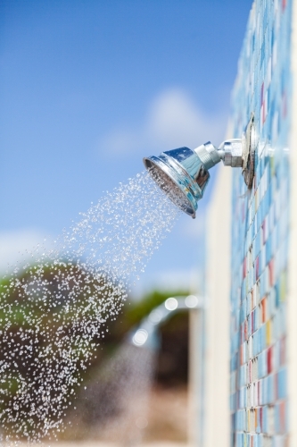 Water from outdoor shower at beach - Australian Stock Image