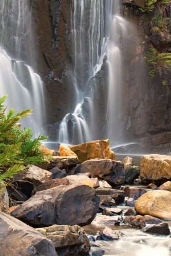 Waterfall with rocks in foreground