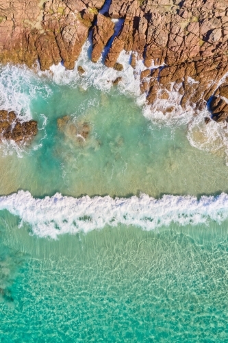 Wave on Bunker Bay rocks near Dunsborough in Western Australia's South West. - Australian Stock Image