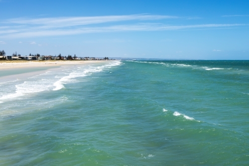 waves breaking on sandbar at a city beach - Australian Stock Image
