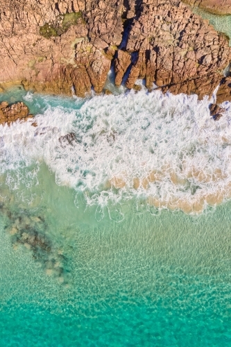 Waves crashing onto rocks at Bunker Bay, near Dunsborough, Western Australia - Australian Stock Image