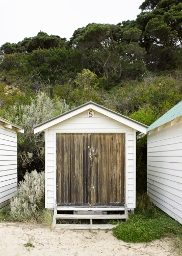 Weathered beach box at a swimming beach - Australian Stock Image