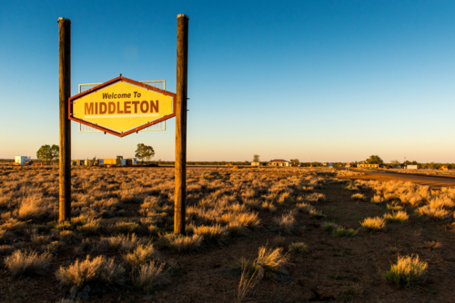 Welcome sign at Middleton in the golden light of late afternoon - Australian Stock Image