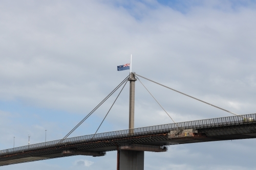Westgate Bridge in Melbourne Australia with flag at half mast due to death - Australian Stock Image