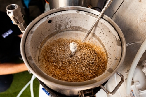 Wheat in beer boiler - Australian Stock Image