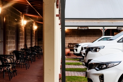 White cars parked outside the restaurant - Australian Stock Image