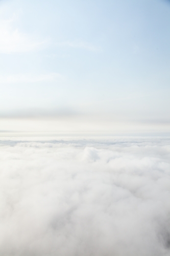 White clouds filling sky seen from above - Australian Stock Image