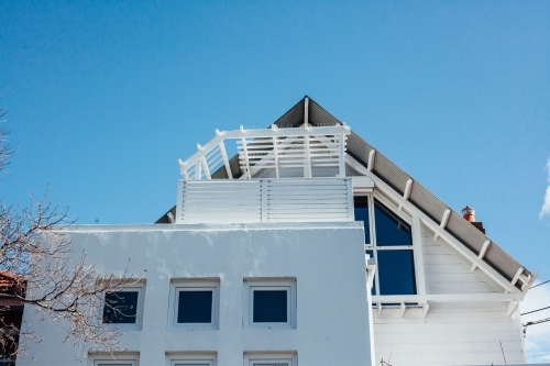 White home in front of blue sky