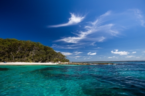 White sand beach viewed from the water - Australian Stock Image