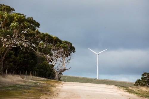 Wind turbine and regional road on the Fleurieu Peninsula - Australian Stock Image