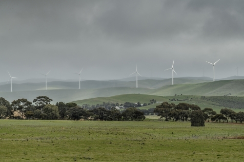 Wind turbines during rainy weather - Australian Stock Image