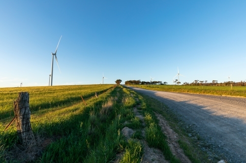 wind turbines near a country road - Australian Stock Image