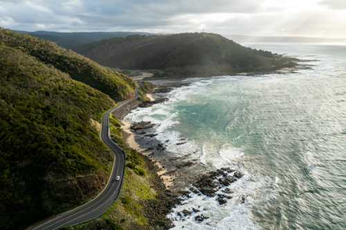 Winding coastal road along the Great Ocean Road. - Australian Stock Image