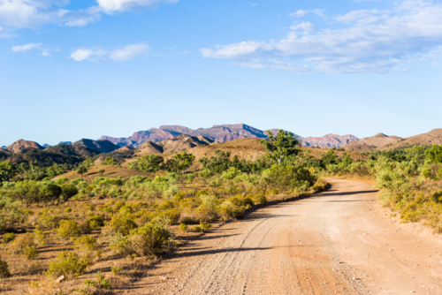 Winding dirt road through the rugged landscape of the Flinders Ranges - Australian Stock Image