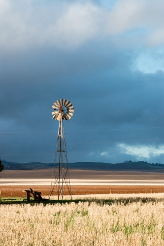 Windmill lit by afternoon light - Australian Stock Image