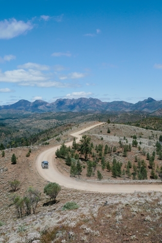 Windy dirt road leading through the Flinders Ranges - Australian Stock Image