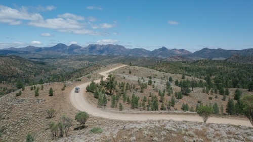 Windy dirt road leading through the Flinders Ranges - Australian Stock Image