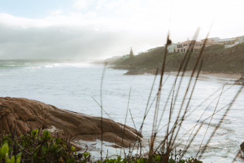 Winter view of frothy waves in Knights Beach, Port Elliot, South Australia - Australian Stock Image