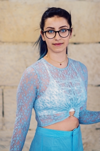woman in blue outfit - Australian Stock Image