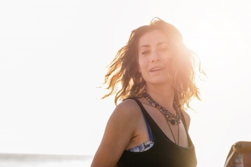 woman in bright sunlight - Australian Stock Image