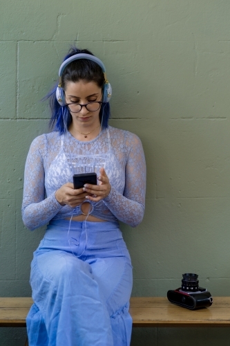 woman listening to music - Australian Stock Image