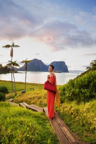 Woman on a board walk on Lord Howe Island - Australian Stock Image