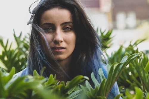 woman's face in plants - Australian Stock Image