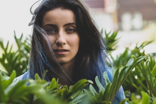 woman's face in plants