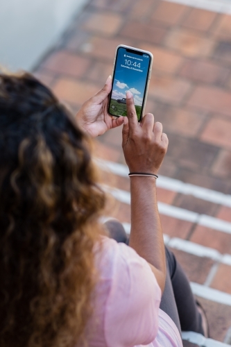 woman using mobile phone - Australian Stock Image