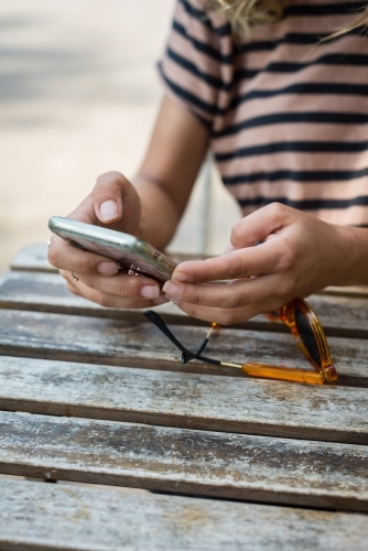 woman using mobile phone - Australian Stock Image