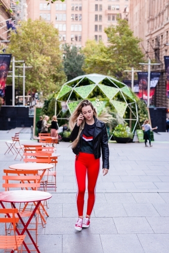 woman using phone in the city - Australian Stock Image