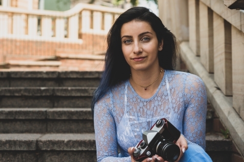 woman with camera - Australian Stock Image