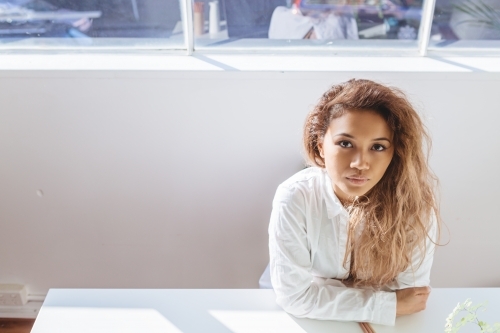 Woman with serious expression with clear space for text - Australian Stock Image