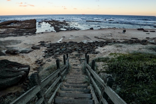Wooden stairway leading to beach at Norah Head lighthouse, New South Wales Australia - Australian Stock Image