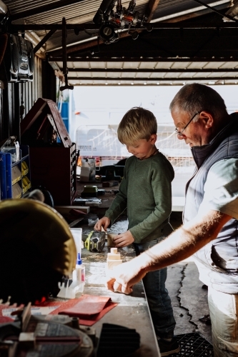 Woodworking with grandad - Australian Stock Image