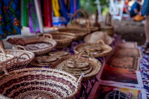 Woven baskets in market stall - Australian Stock Image