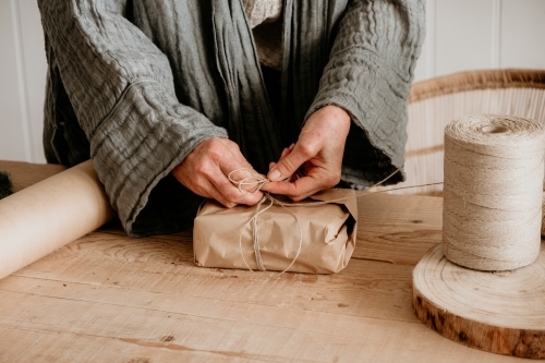 Wrapping gifts - Australian Stock Image