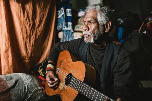 Wurundjeri Elder Playing Guitar