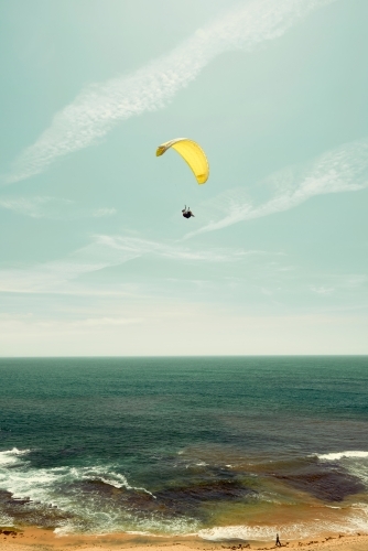 Yellow parachute on the coast with a horizon - Australian Stock Image