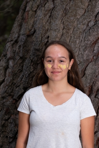 Young Aboriginal Girl in Traditonal paint - Australian Stock Image