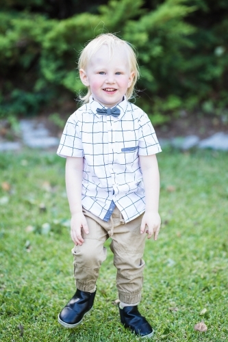 Young blonde caucasian boy smiling - Australian Stock Image