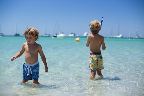 Young boys playing at beach - Australian Stock Image