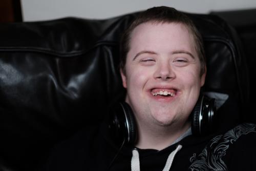 Young Disabled Man Smiling - Australian Stock Image