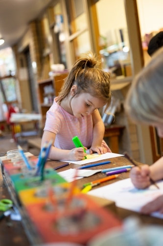 Young girl at pre-school, drawing - Australian Stock Image