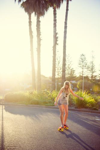 Young Girl skateboarding - Australian Stock Image