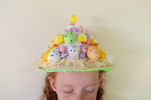 Young girl wearing an Easter hat - Australian Stock Image