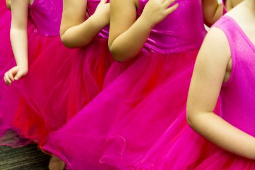 Young girls dressed in pink to perform at a ballet concert - Australian Stock Image